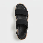 Mallow — Crossed elastic straps, esparto base, and comfortable platform